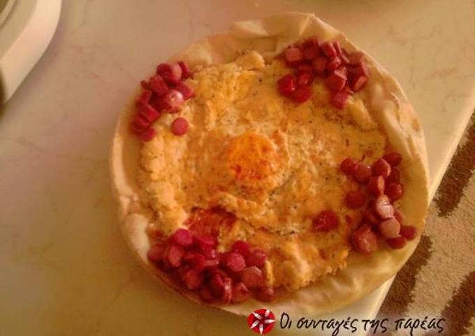 κύρια φωτογραφία συνταγής Αράβικη πίτα με ομελέτα φέτας και κρόκο αυγού