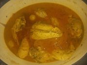 Una foto de pollo con papines