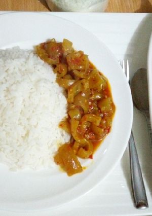 A picture of White rice with pomo sauce and watermelon.