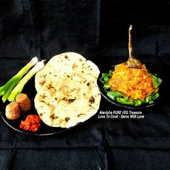 Baingan Bharta With Bajra Roti Ringana No Olo With Bajara Rotlo A picture of Baingan Bharta With Bajra Roti Ringana No Olo With Bajara Rotlo.