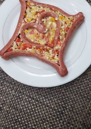 A picture of Scrambled egg with Sausage.