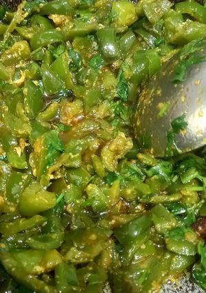 A picture of Shimla mirch with achar masala, less ingredients.