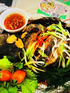 Hình của món Cá song (cá mú) nướng giấy bạc.