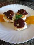 Profiteroles rellenos y bañados de ganache