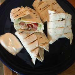 A picture of Cilantro lime chicken avocado burritos.