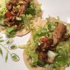 A picture of Chicken Shawarma with tahini yogurt sauce.