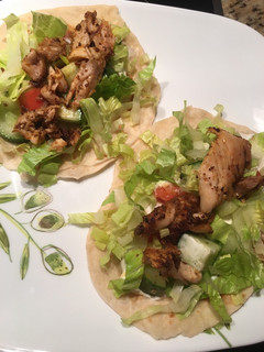 A picture of Chicken Shawarma with tahini yogurt sauce.