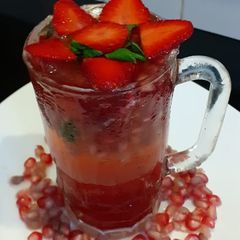 A picture of Strawberry pomegranate Mojito.