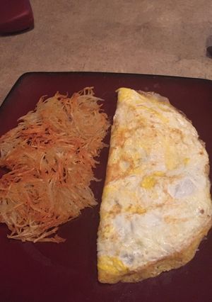 A picture of Omelette and Hash Browns.