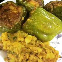 A picture of Potato stuffed capsicum.