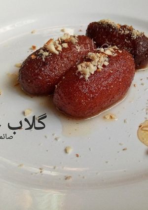 A picture of Gulab jamun with homemade lassa khoya.