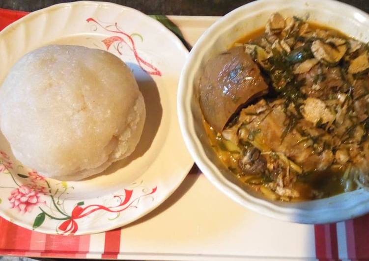 Ukazi soup with white garri