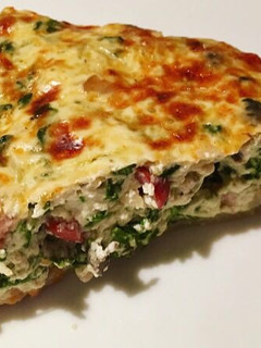 Una foto de Quiche de espinacas y champiñones