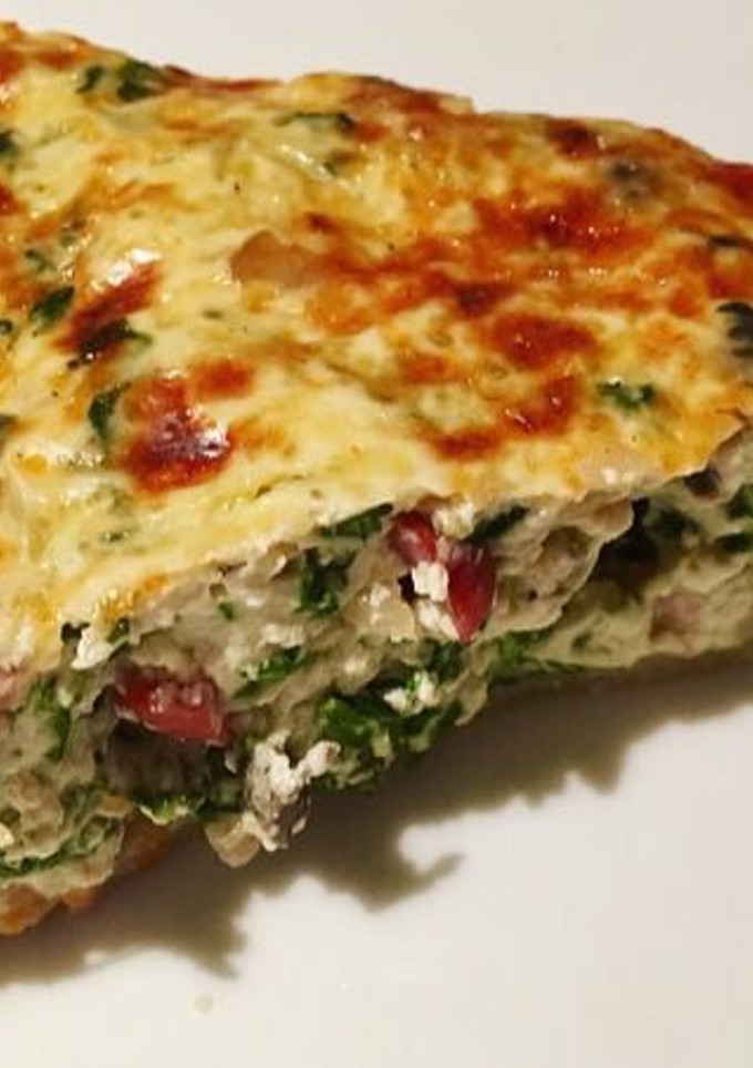 Una foto de Quiche de espinacas y champiñones