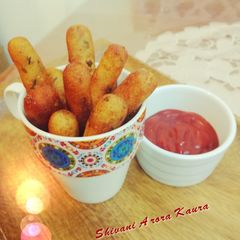 A picture of Golden potato semolina fingers.