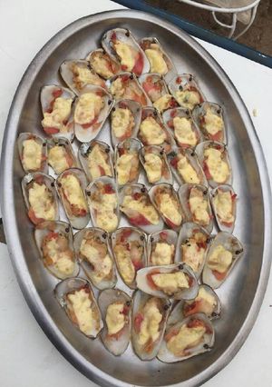 Una foto de Machas a la parmesana