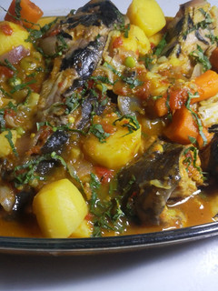 A picture of Cat fish pepper soup with veggies.