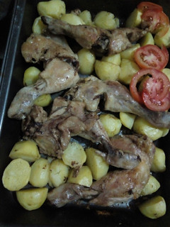 A picture of Oven roast chicken and potatoes.