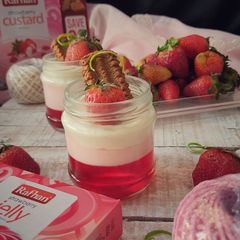 A picture of Strawberry jello custard shots.