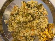 A picture of rice and mixed vegetables