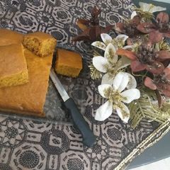 A picture of Orange and carrot cake soft and tea taim cake with tea.