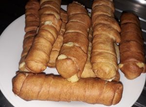 Una foto de Churros de queso 🧀