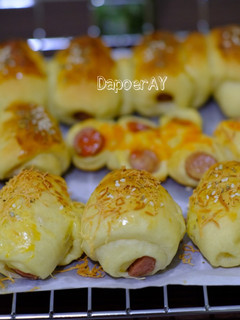Foto resep Roti Unyil Sosis Keju Menul²