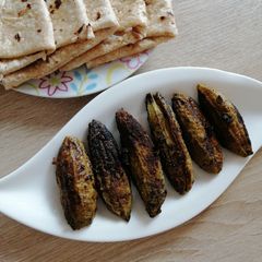 A picture of Besan stuffed karela(bitter gourds).