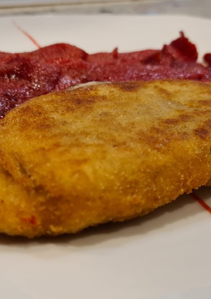 Una foto de San Jacobo de pollo
