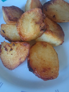 Una foto de Papas salteadas