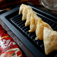 A picture of Fish & Cheese Samosa.