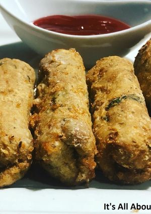 A picture of Cheesy Chicken Cigars.