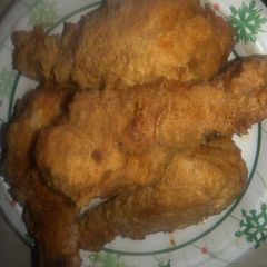 A picture of Southern style fried chicken legs.