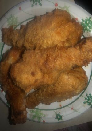 A picture of Southern style fried chicken legs.