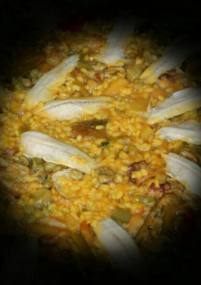 Una foto de Arroz con boquerones