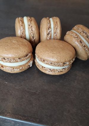 A picture of Coffee-Hazelnut Macarons with White Chocolate Ganache.