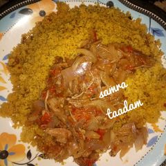 A picture of Couscous with onion sauce.