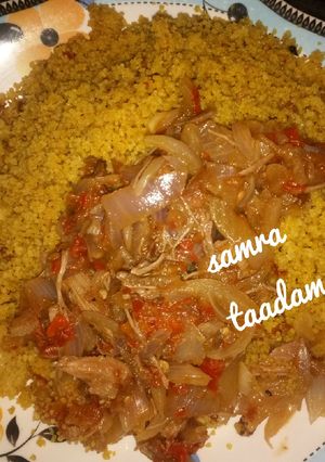 A picture of Couscous with onion sauce.
