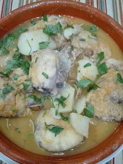Una foto de Pescado en Salsa Verde con Almejas