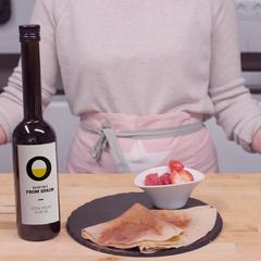 A picture of Crepes with spiced strawberries.