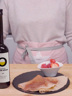 A picture of Crepes with spiced strawberries.