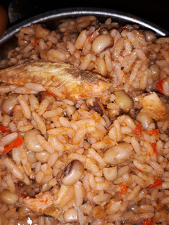 A picture of Jollof rice and beans.
