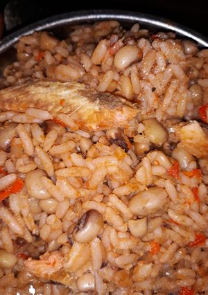 A picture of Jollof rice and beans.