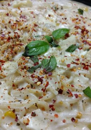 A picture of Spaghetti in Alfredo Sauce.