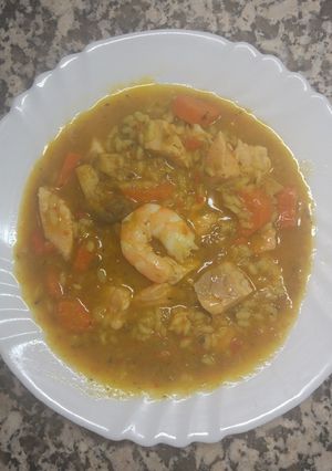 Foto principal de Arroz caldoso de salmón, setas y langostinos