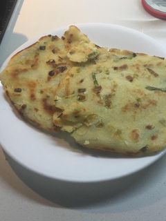 Una foto de Árepas con cebollín