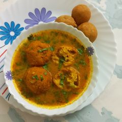 Bhalla curry (Moong dal bhalla) A picture of Bhalla curry (Moong dal bhalla).