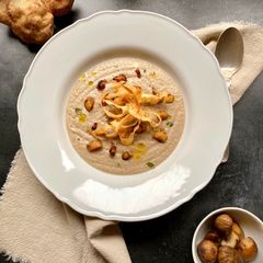 A picture of Sunchokes (Jerusalem artichokes) and chestnut velouté.