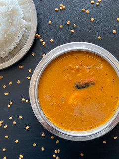 A picture of Vendhaya kulambu (Fenugreek gravy).