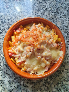 Una foto de Patatas con queso y bacon